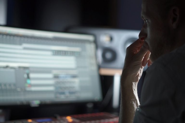 DJ Boris Brejcha in his studio with ADAM Audio S3H studio monitors.